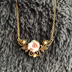 Vintage gold necklace with rose